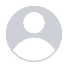 Generic gray user profile placeholder icon with a circular head and curved shoulder silhouette.